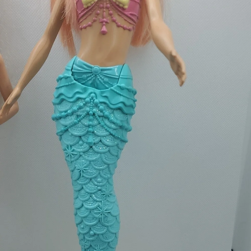 Mattel Dolls with Blonde Hair and Colorful Outfits